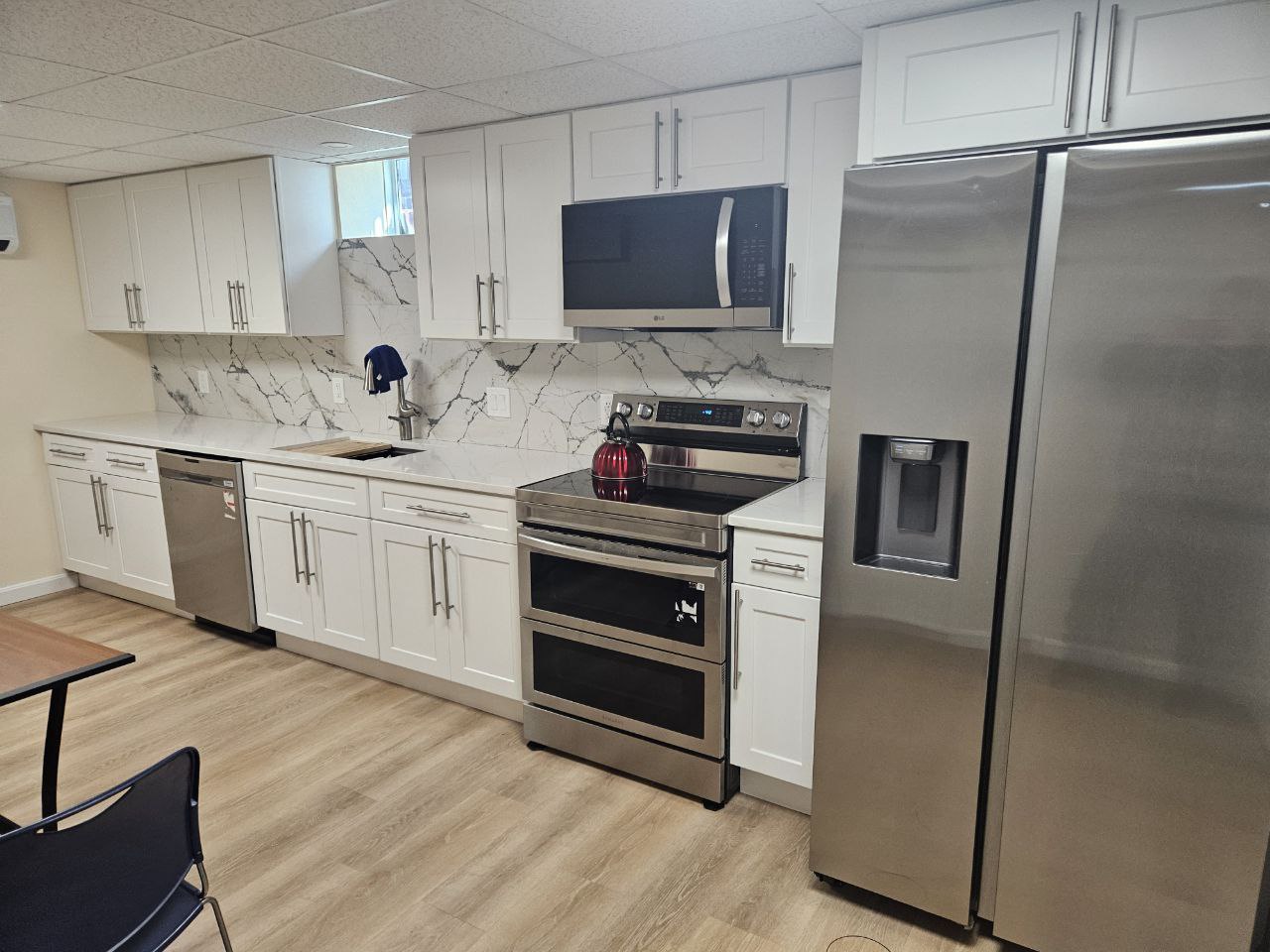 2 bedroom, 1 bathroom apartment in Newton Corner with parking and in-unit laundry, $1,250 per room or $2,500 for full apartment.