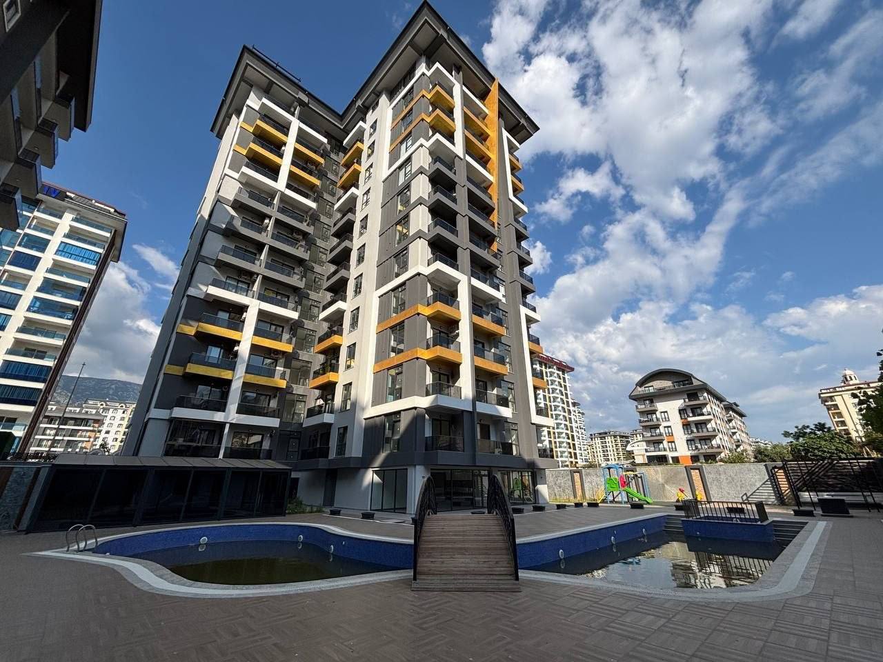 Продажа квартиры 1+1, 58кв.м в Махмутларе, 500м до пляжа